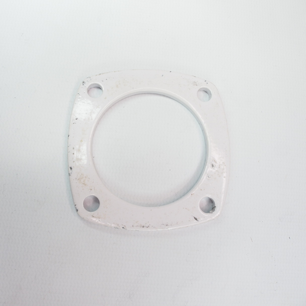 Rear hub bearing retaining washer plate for LAMBRETTA